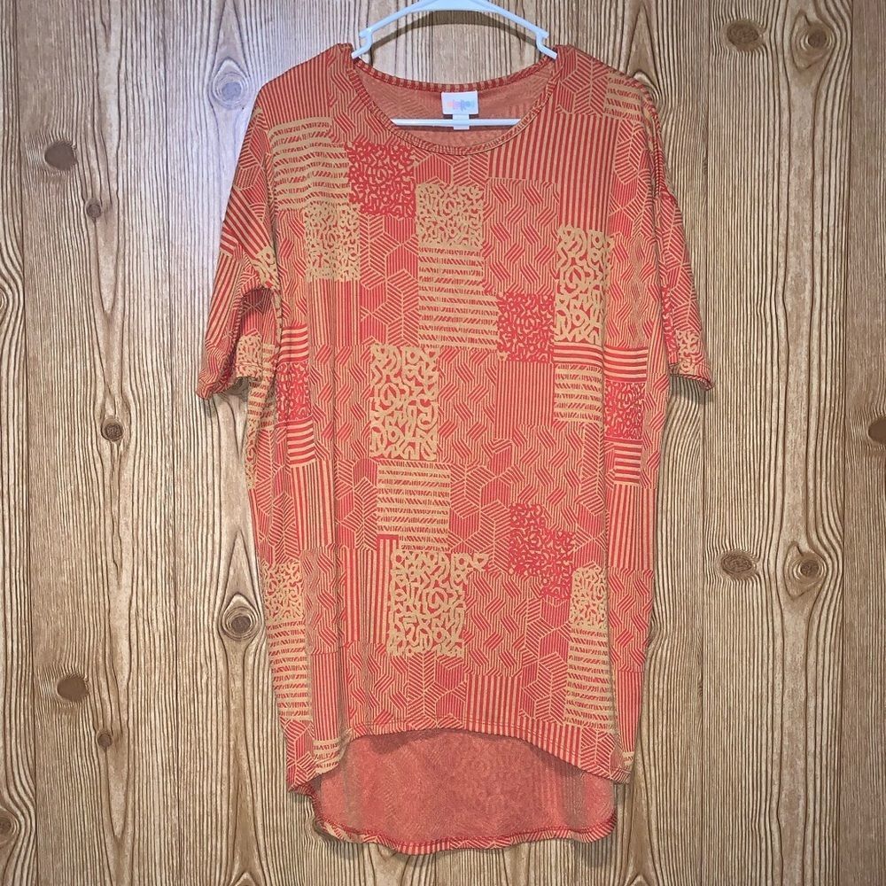 LuLaRoe | Orange Patterned Irma Top